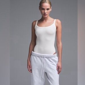 Skims Cotton Jersey Scoop Neck Bodysuit in Marble